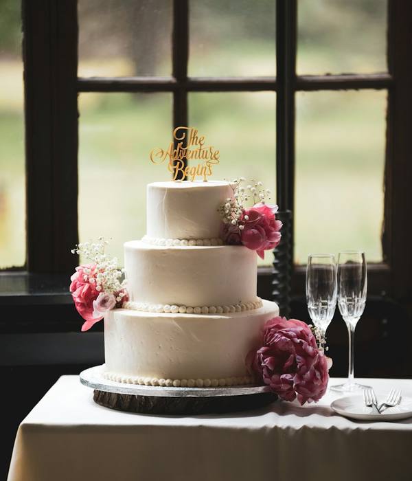 Smooth white buttercream wedding cake