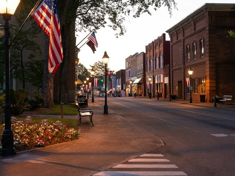 Small-town main street square with storefronts