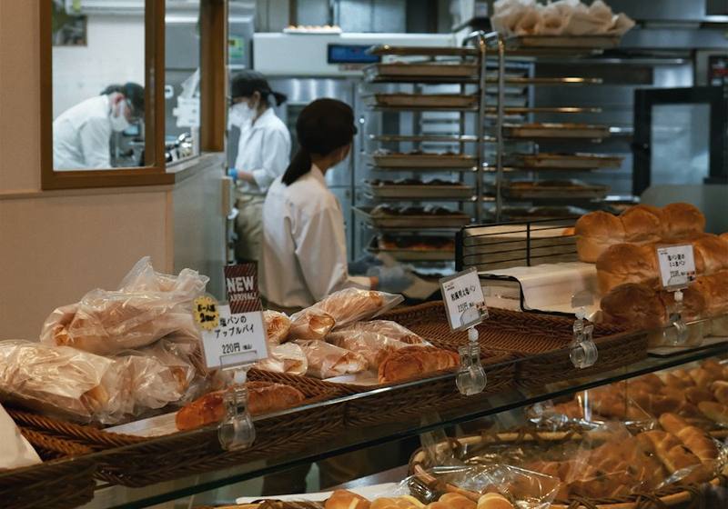 Café counter with fresh bread and pastries on display